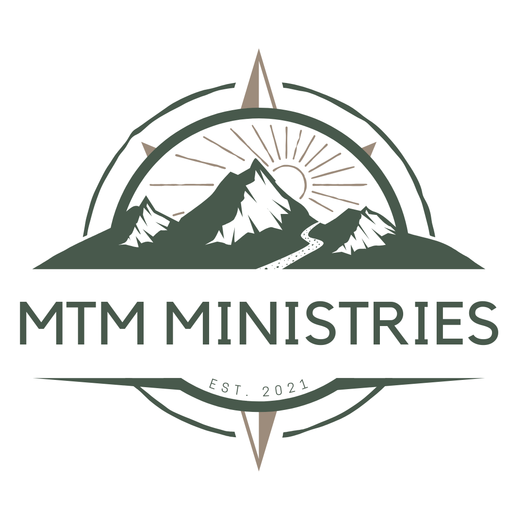 MTM Ministries with mountains and a sun with a compass surround.
